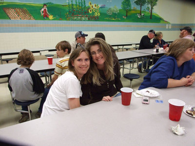 Image: Two Friends — Kelly Svehlak and Ronda Cockerham enjoying the PTO fundraiser.