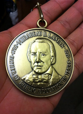 Image: Mirabeau B. Lamar medal — Jesus Perez displays his Mirabeau B. Lamar medal he received for excellence in education.