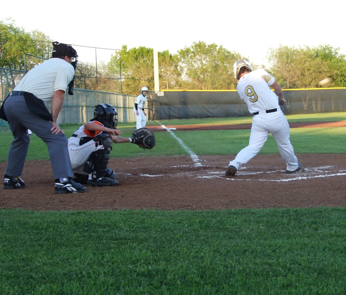 Image: One big whack to centerfield — Ethan Simon hit one straight into centerfield at the bottom of the first and brought Buck in for a score.