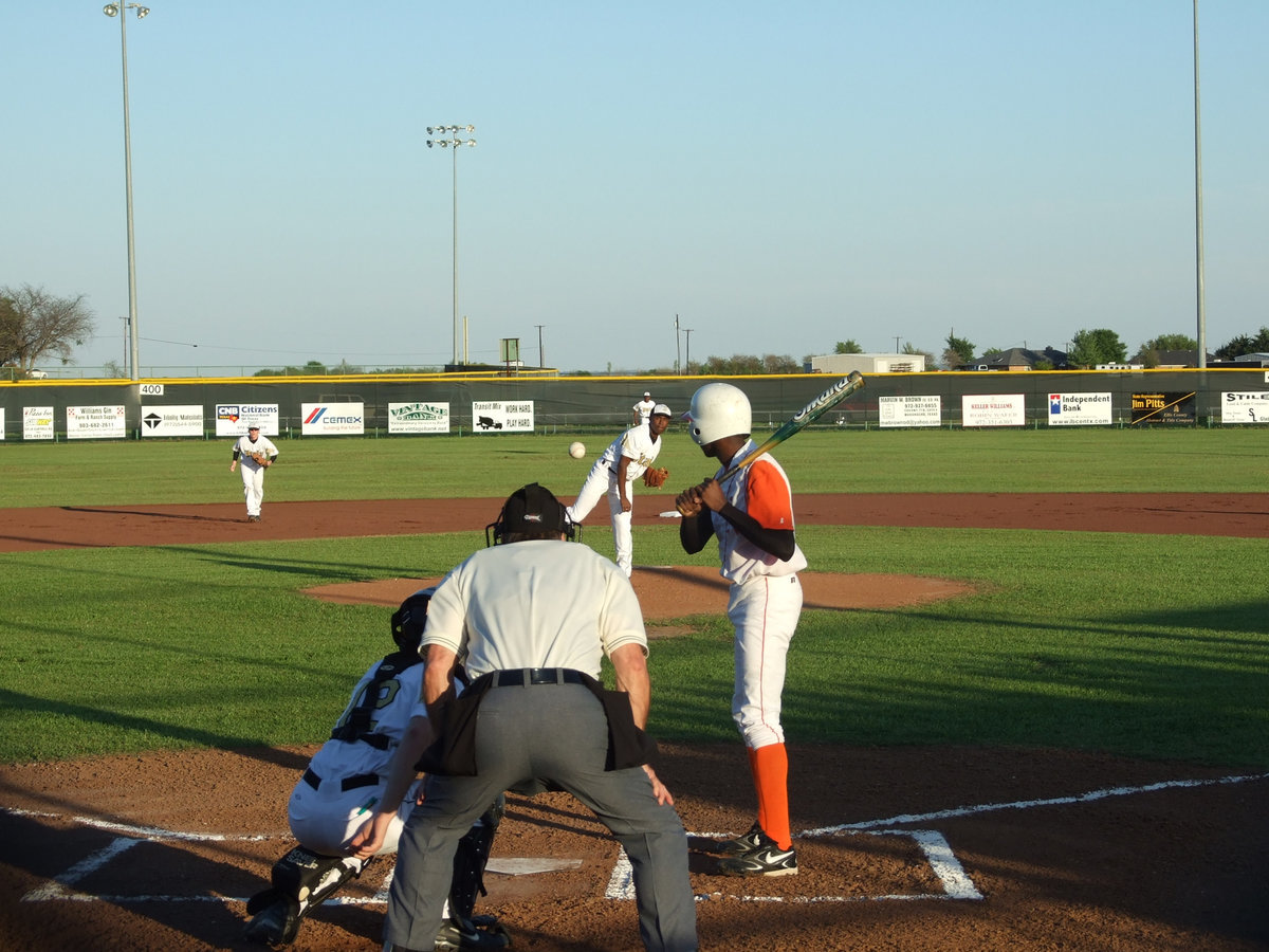 Image: Jasenio pitches the game — Jasenio Anderson throws it right down the middle for 3 up and 3 down.