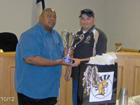 Image: Mayor presents cup to IYAA — Mayor Frank Jackson presents Jason Escamilla and the IYAA this honorary cup. The city council also declared October 14 to be IYAA Day.
