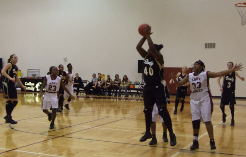 Image: Reed ready — Jimesha Reed captures the ball before Faith could run to the goal.