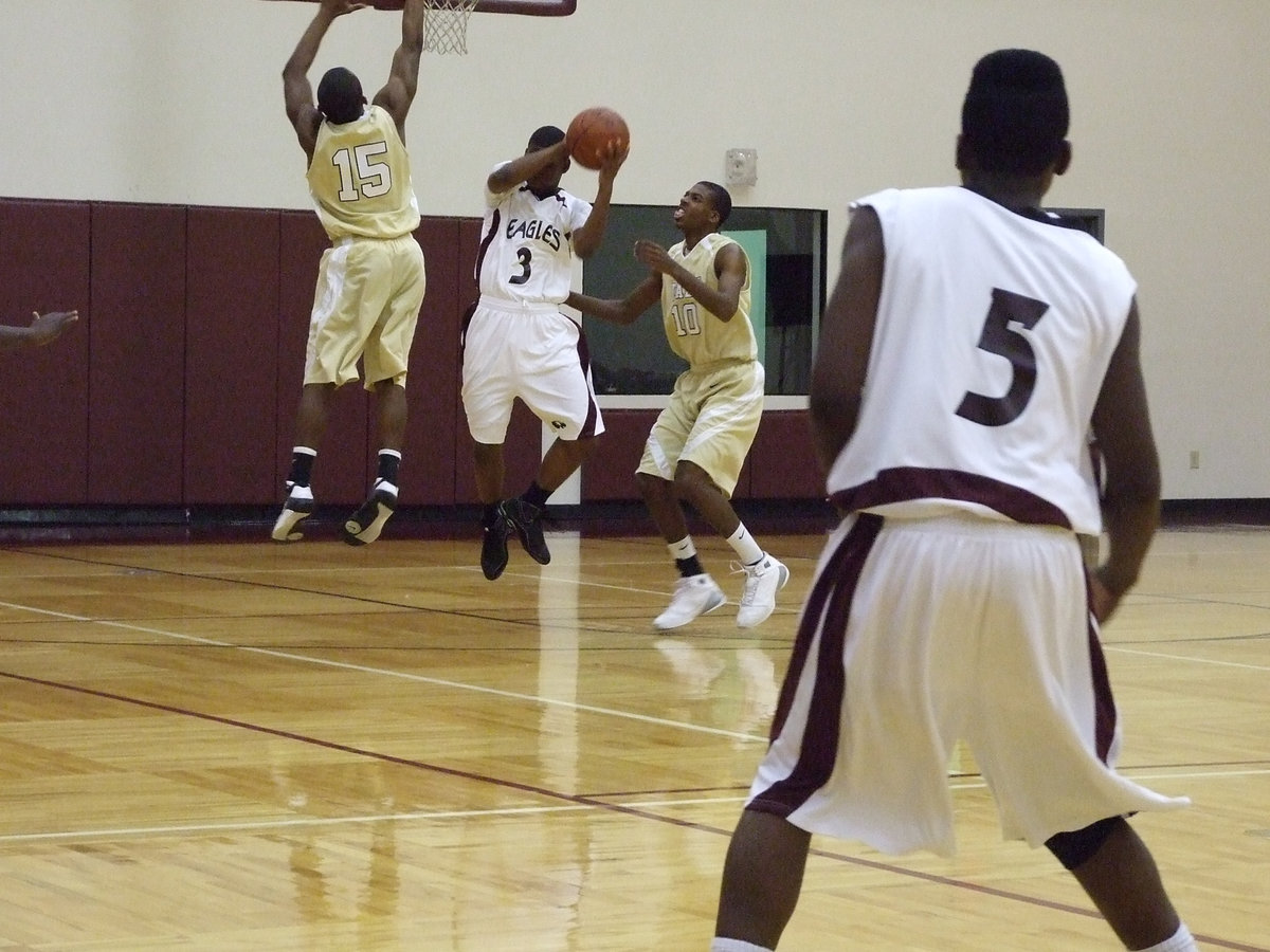 Image: Desmond Anderson — Desmond Anderson works to block an Eagle shoot.