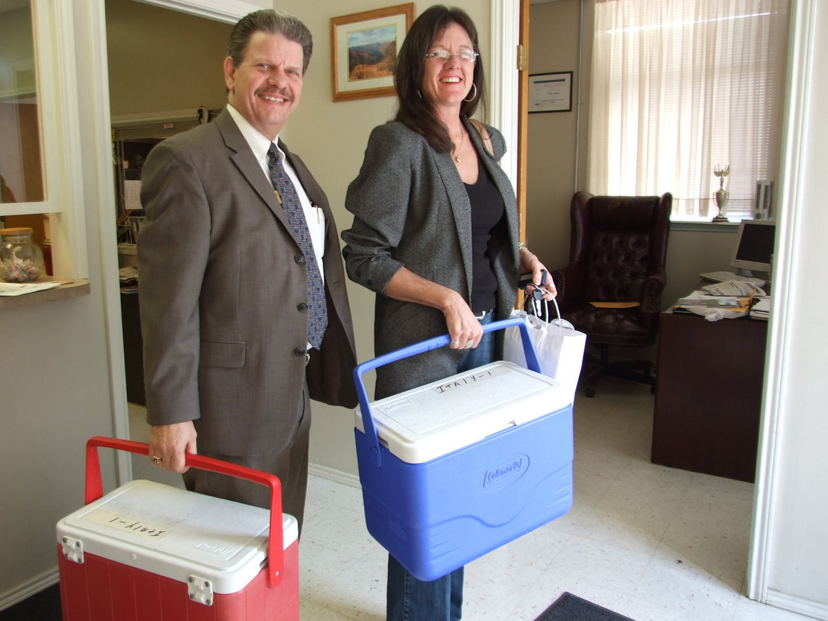 Image: Lets Go Deliver Meals — They are headed out the door to deliver their meals.