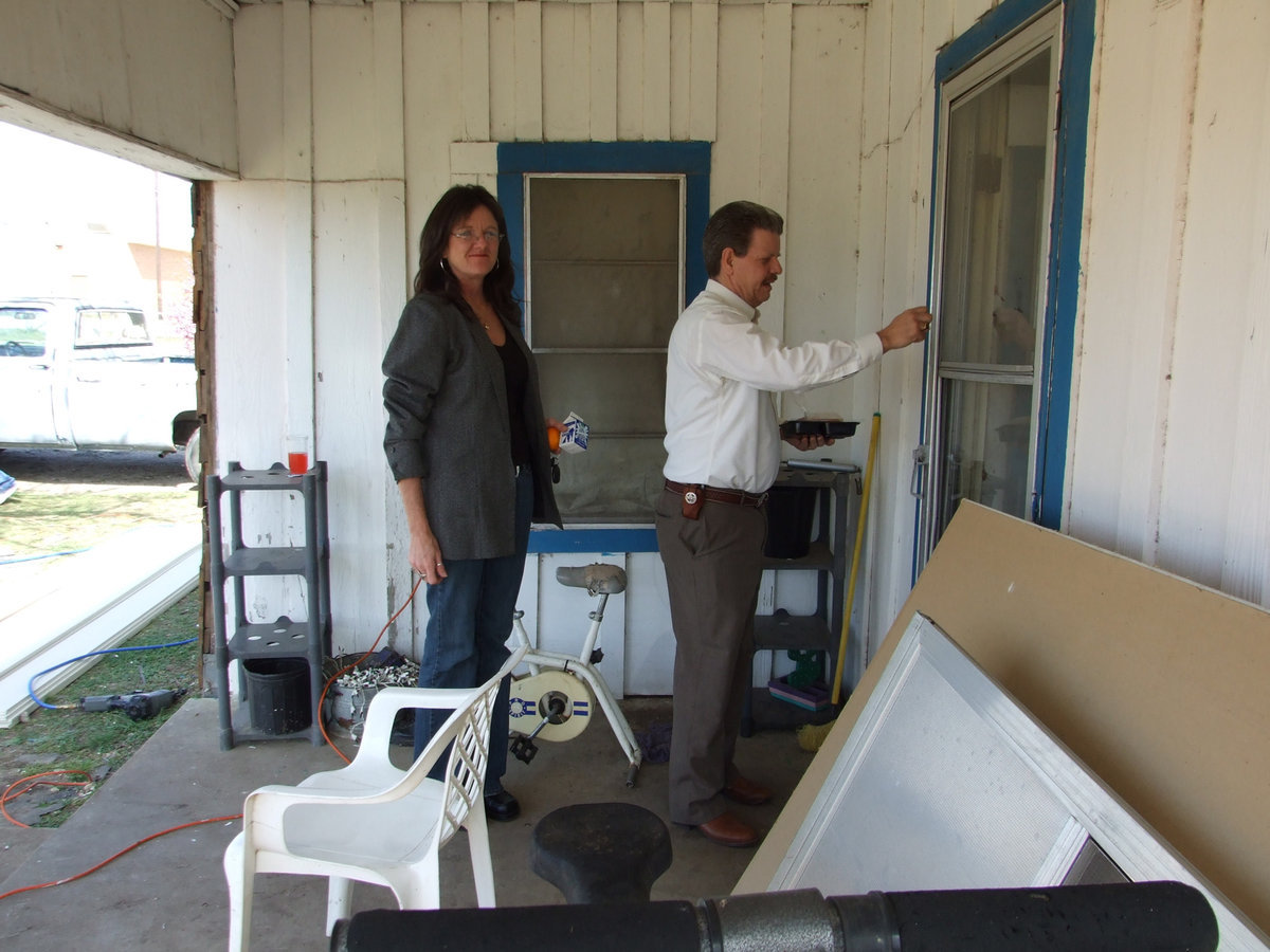 Image: We’re Here With Lunch — Terri and Jerry delivering meals with a smile.