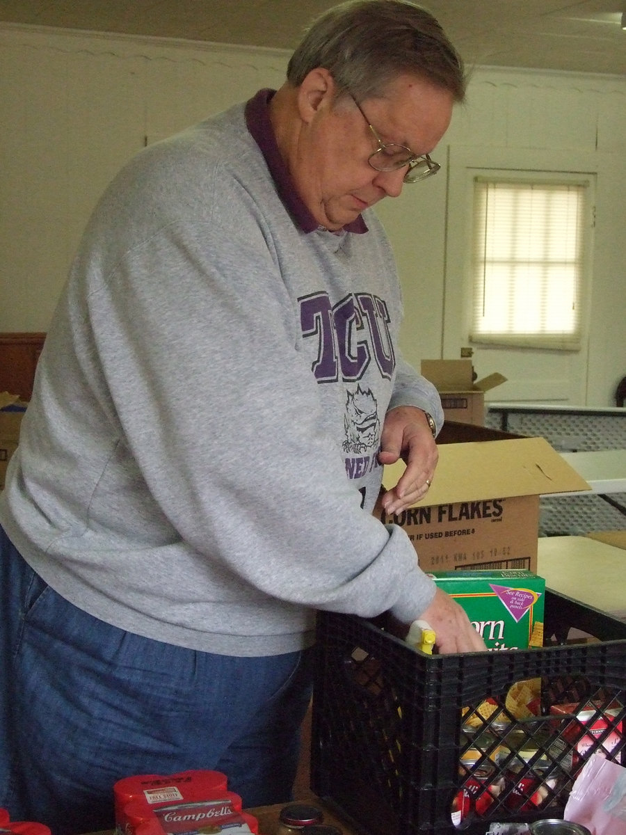 Image: Pastor Bill Morgan — Looks like Pastor Morgan of Family Faith has bagged groceries before.