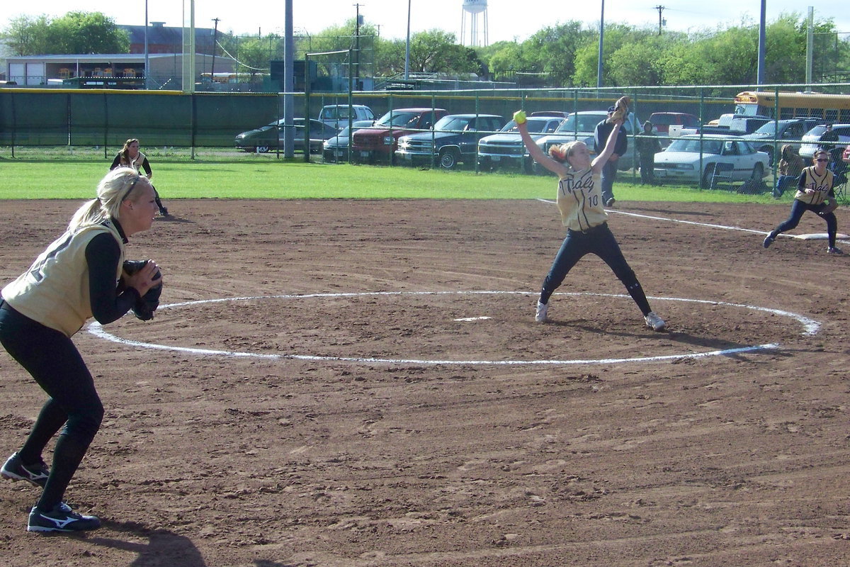 Image: Westbrook strides out — Courtney Westbrook brings the heat as the infield gets “down-n-ready”.