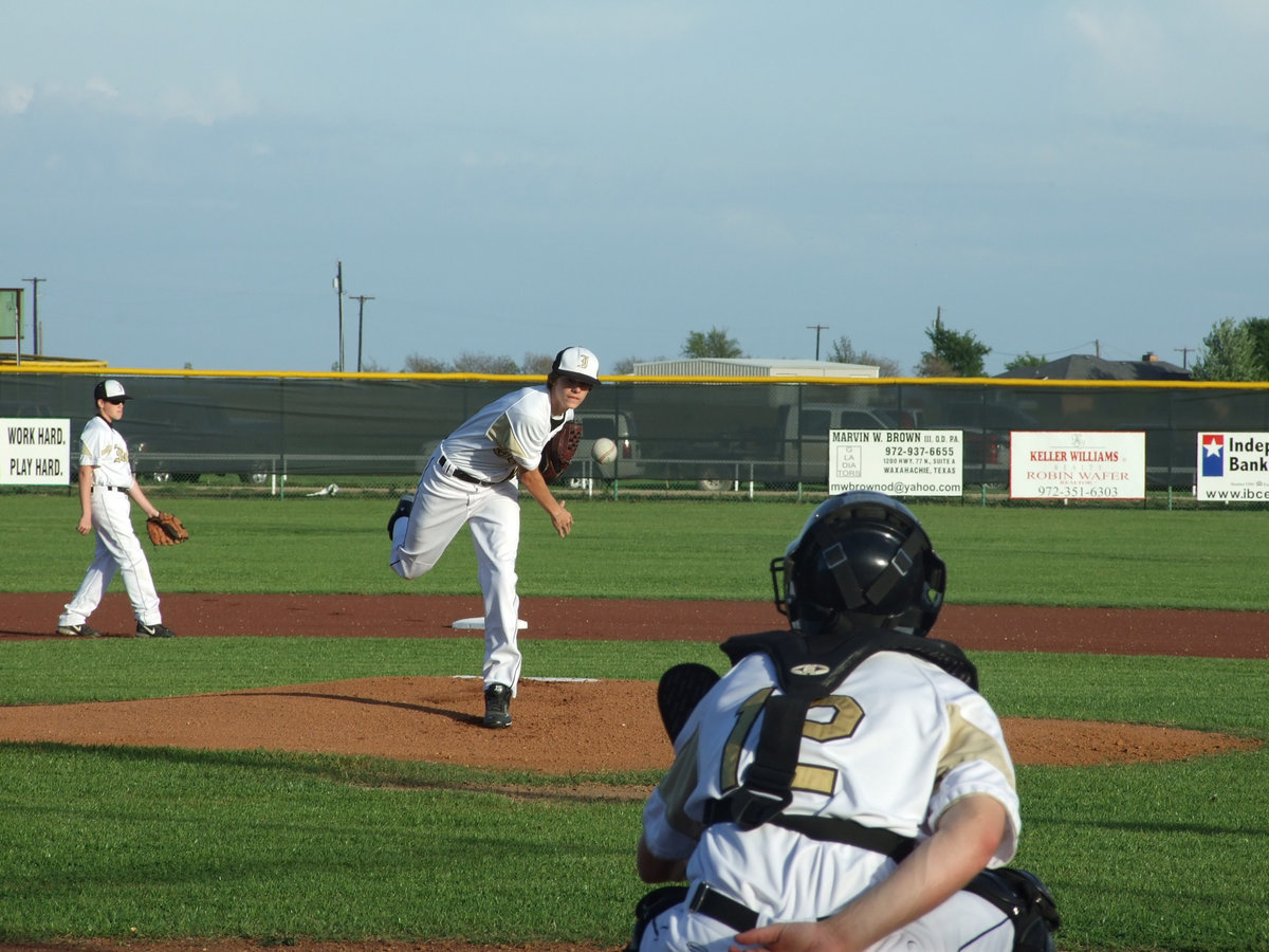 Image: Colten warms up — Colten Campbell and Ryan Ashcraft warm up before the game begins.