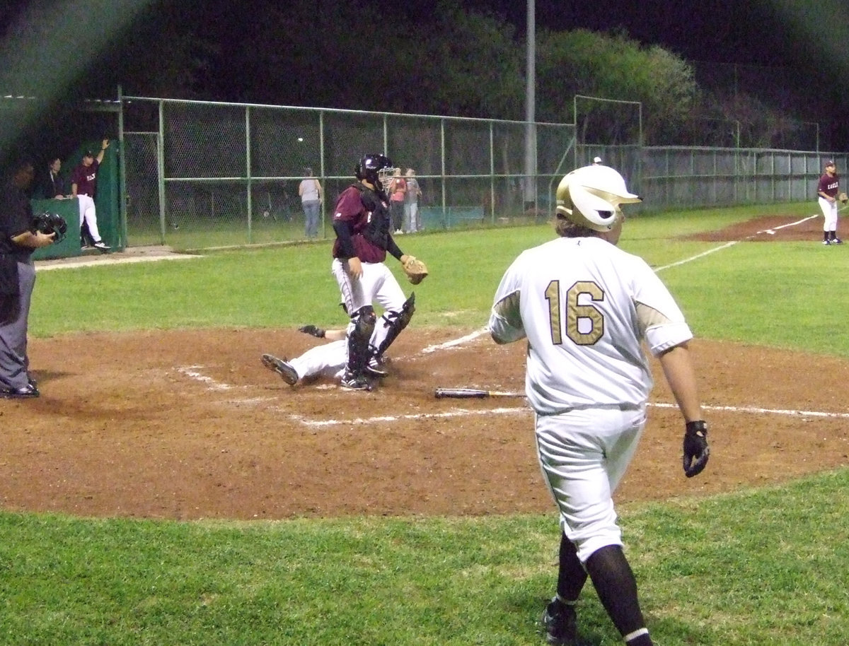 Image: Wilkins in — The bunt plan worked and Kyle scored for the Gladiators.