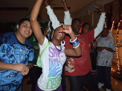 Image: Students enjoyed dance — A photographer took photos at the dance for entertainment and fundraising.