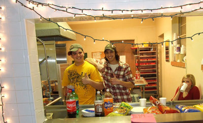 Image: Refreshments anyone — Megan Hopkins, Chase Michaels and Ross Enriquez serve chips and drinks at the dance.