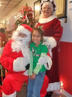 Image: Hannah Carr — Another fun picture with Santa and Mrs. Claus.