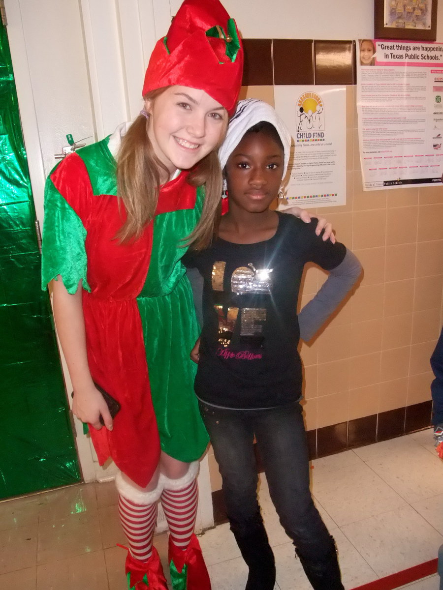 Image: Cutest Elf Ready to Help — This cute elf loves helping the children tell Santa their Christmas dreams.