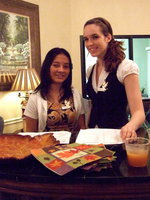 Image: Maria Luna and Melissa Smithey — These two Italy High School students were working the reservation desk for the Thanksgiving dinner.