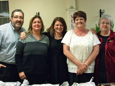 Image: Servers — Barry Wilsford, Nickie Pate, Jill Kordsmeyer, Dodi Chambers, Kathleen Lutrell are all staff members of Trinity Mission serving up the delicious Turkey dinner.