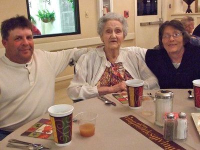 Image: Brian, Buna and Karen — Brian and Karen Mathiowetz are dining with Buna Guthrie for Thanksgiving dinner.