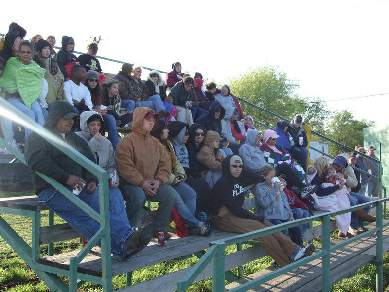 Image: A little "frosty’ — The crowds gathered Friday night-probably for warmth-in the stands and drank hot chocolate and sang Take Me Out To The Ball Game.