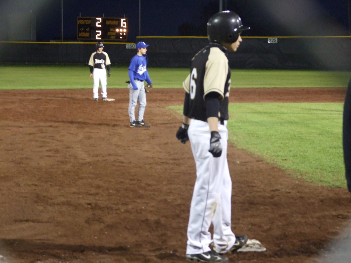 Image: Crownover waits — Dan Crownover waits patiently to slide into home.