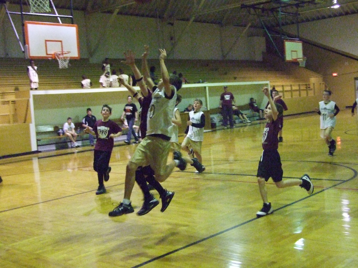 Image: Colton Petry shoots — Coach Windam’s team (5th/6th boys) fast break against Hillsboro Maroon.