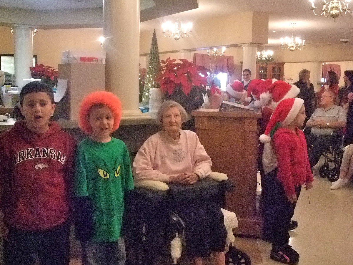 Image: Second Graders and Resident — This resident was just part of the singing team.