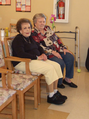 Image: Residents Enjoying The Music — Edith Baker and her friend are enjoying the music. Edith said, “I think Clyde is a great singer.”