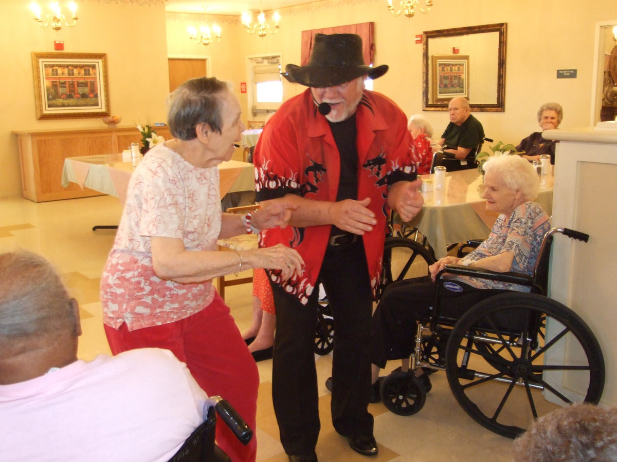 Image: Hoppin’ and A Boppin’ — Miss Cullen and Clyde Ferrell “cuttin’ a rug.”