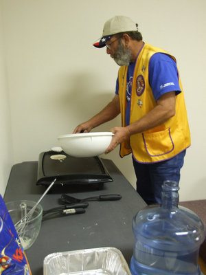 Image: Mark Souder Sr. — Mark (vice president of Italy’s Lions Club) is whipping up a batch of delicious pancakes.