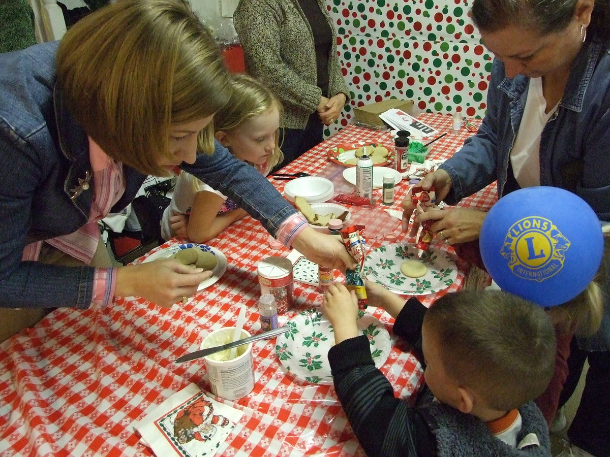 Image: Cookie time — There were about 30 vendors inside and out on Saturday.  Some were even giving away cookies.