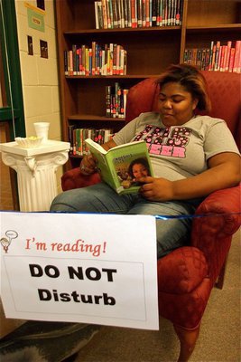 Image: Sa’Kendra Norwood  — Sa’Kendra Norwood proves school mascots enjoy quality reading time as well during the IHS Reading Marathon.