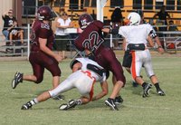 Image: Protecting the QB — A cut block buys Avalon’s quarterback some extra time in the pocket.