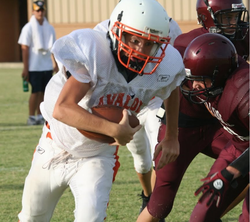 Image: North and South — Avalon’s Sophomore Quarterback Calyn Davis decides the quickest way to the endzone is straight ahead.