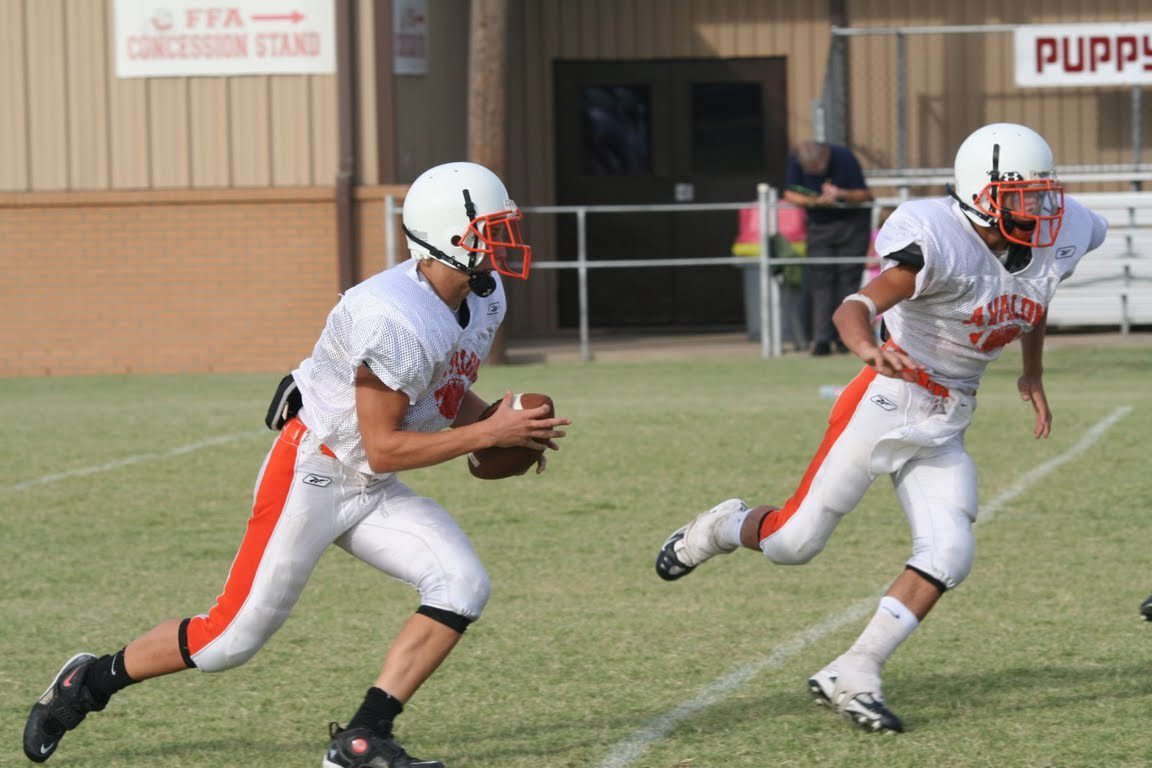 Image: Tuck and run — Avalon’s quarterback keeps the ball and heads upfield.