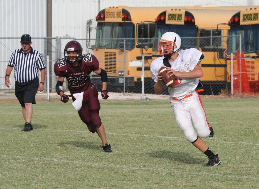 Image: Eagle eye — Avalon Quarterback Calyn Davis uses his Eagle eye to locate a receiver.