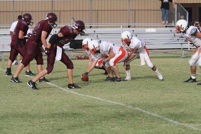 Image: Pre-snap pic — Avalon prepares to claw their way through the Bulldog defensive line.