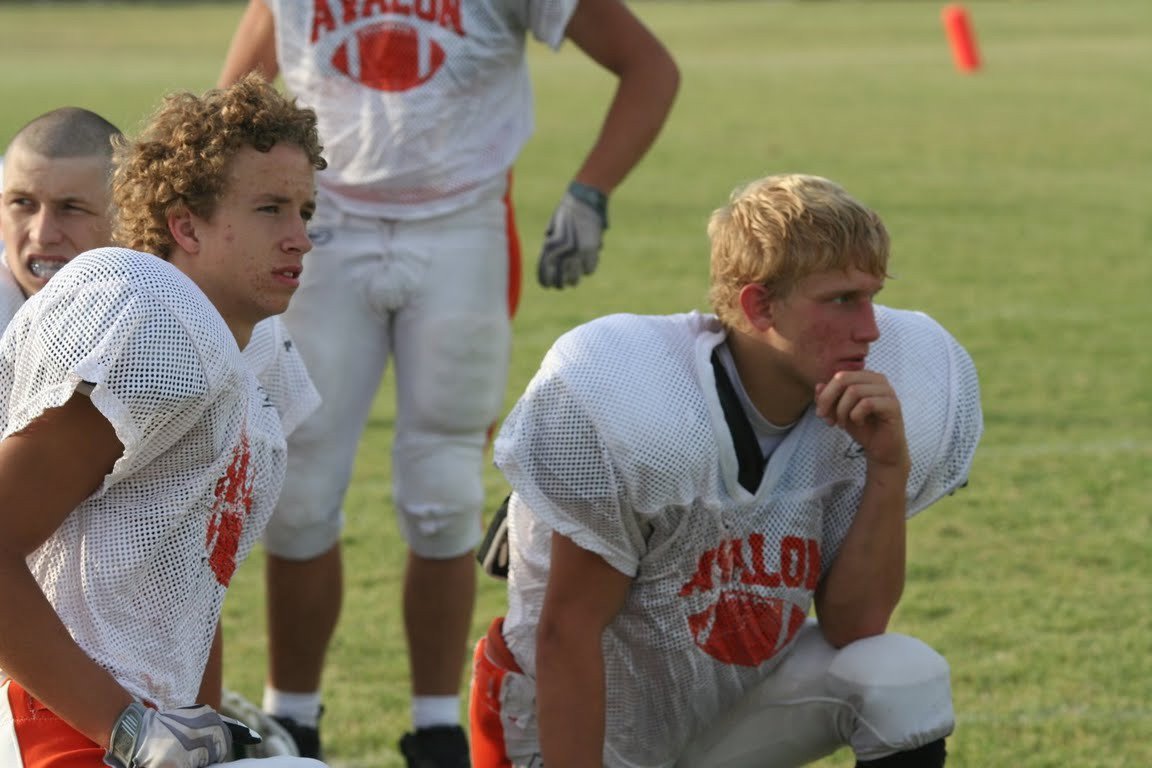 Image: Taking a knee. — Eagles look ahead to their season opener against Waxahachie Advantage.