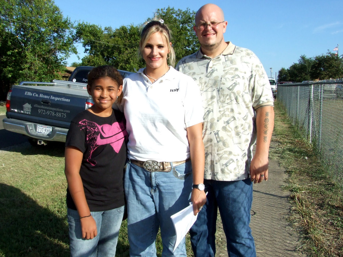 Image: We’re Ready for School — This happy little family can’t wait for school to start.