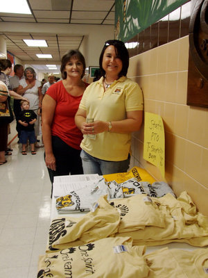 Image: PTO Members — Darlene McBride and Andi Hooker were representing the PTO, selling T shirts and bags on Meet the Teacher Night.