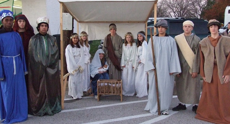 Image: Live Nativity — Mary, Joseph, angels, wise men and the shepherds came to worship Baby Jesus in Bethlehem 2000 years ago.  First Baptist youth took on the roles for the Live Nativity scene Sunday night.