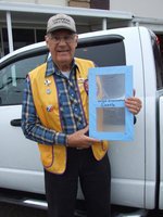 Image: Sample Wind Insulator — Alvin Onstad is holding a small sample of the Wind Insulator.