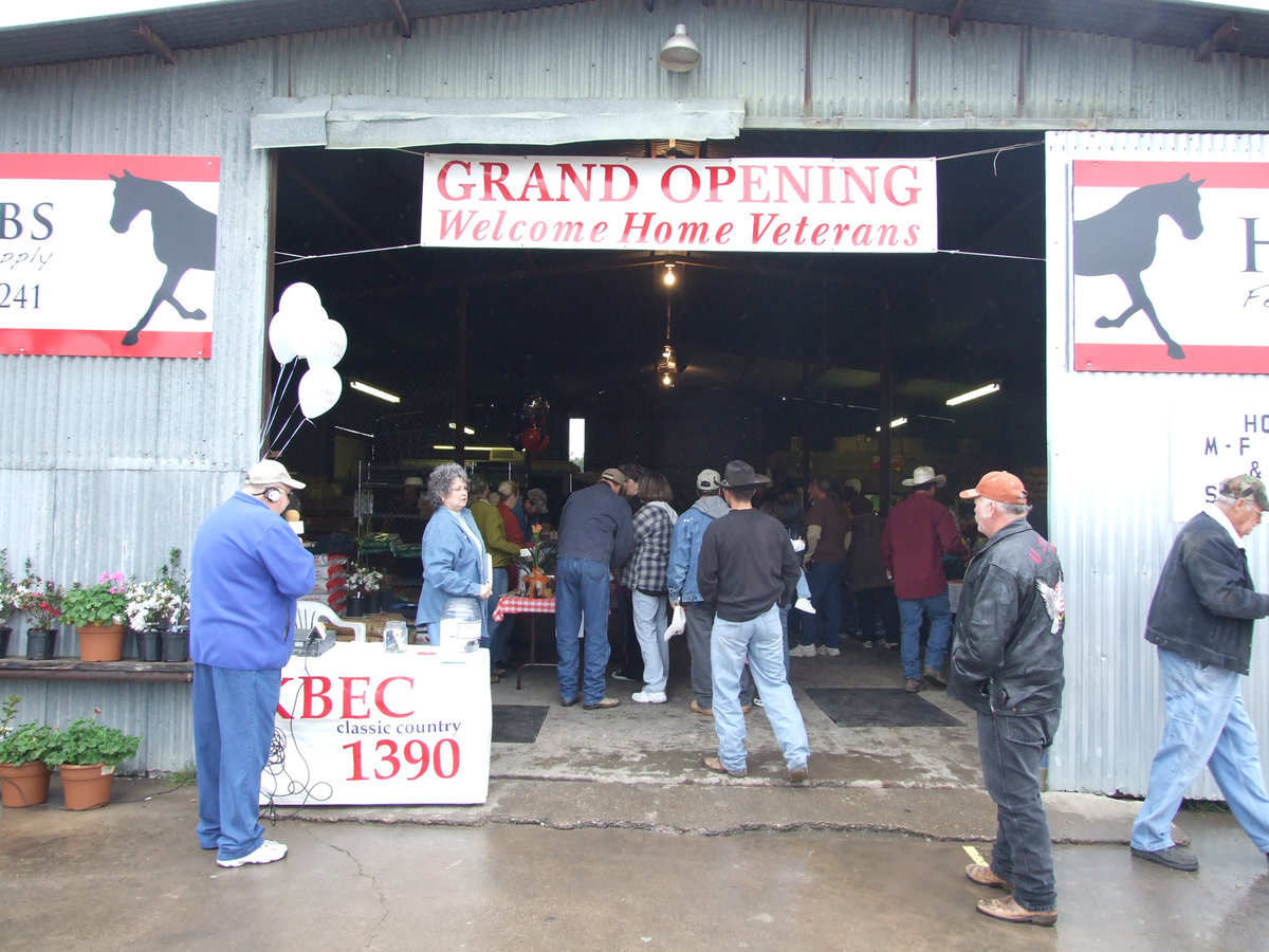 Image: Hobbs Feed &amp; Grain Grand Opening — Many people from our community gathered with the new owners to celebrate their grand opening.