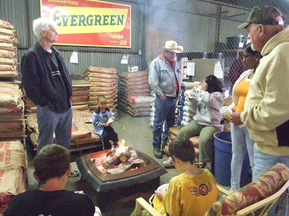 Image: A Nice Fire Inside — There was even a cozy fire inside the feed store for everyone to warm up with.