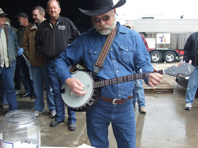 Image: Michael Recksiek — The music director of the Milford Cowboy Church wrote and sang a jingle for the occasion.