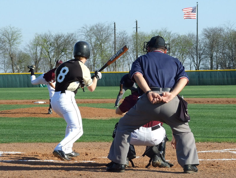 Image: Milligan is up — Josh Milligan works the bunt for the good of the team.