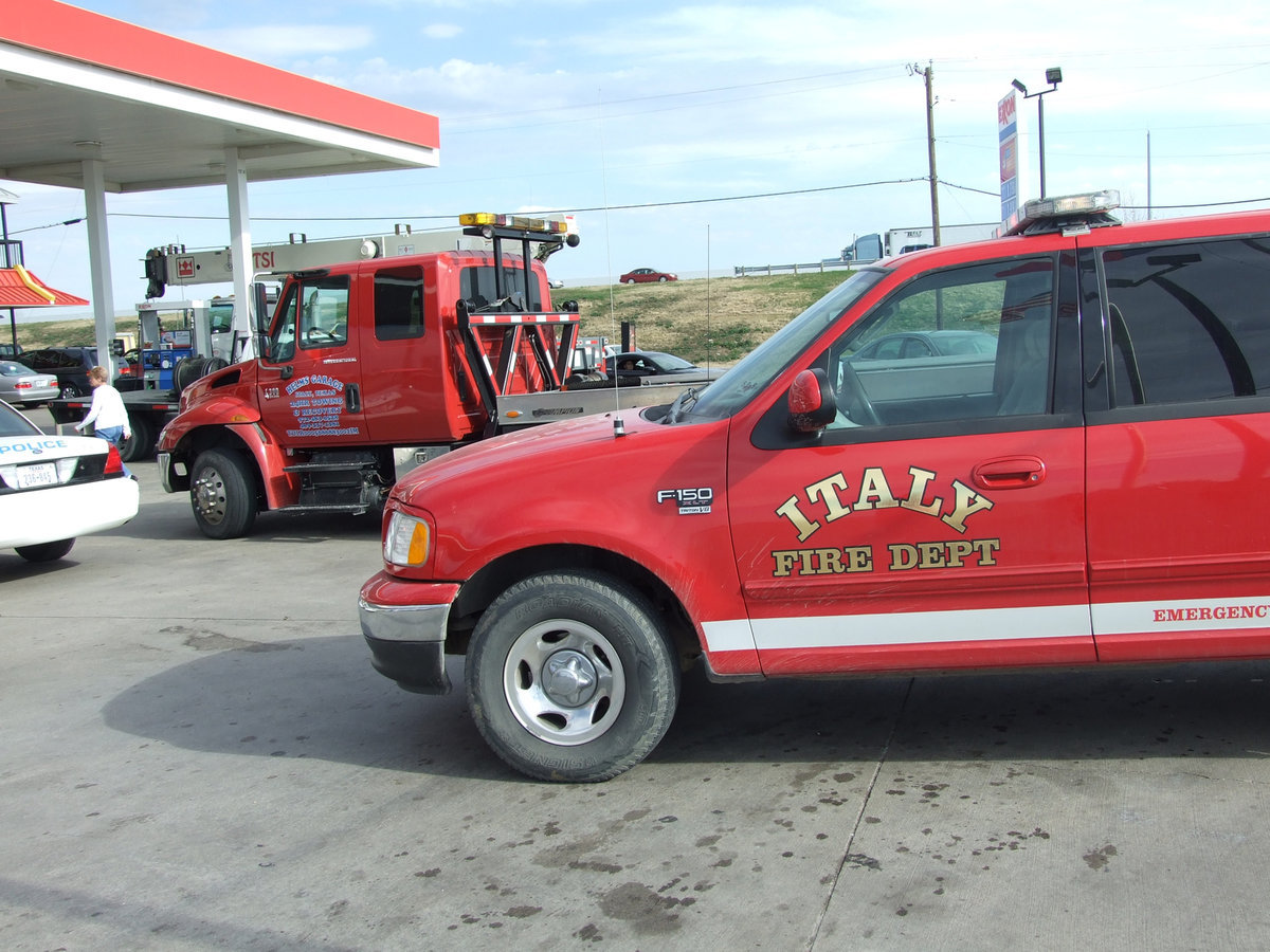 Image: A Quick Response — Two Italy Police cars, two Milford Police cars, two Italy Fire Vehicles and Keith Helms of Helm’s Garage arrived at the Stuckey’s parking to assist paramedics.