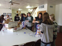 Image: Central Baptist Youth Pitching In — Jazmine Salcido, Misty Salcido, Dhylan Jackson, Zach Latimer, Aaron Israel, Zachary Hernandez, William Youngblood, Heather Hilliard and Holli Love with youth director, Chris Talleri help the Italy Ministerial Alliance Food Pantry.