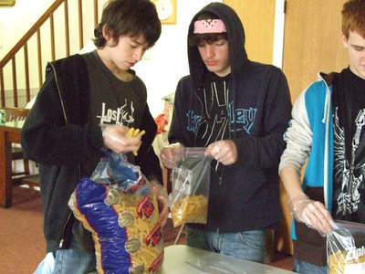 Image: Divide Up the Macaroni — Dylan and Zach separate 5lb bags of macaroni into smaller servings.
