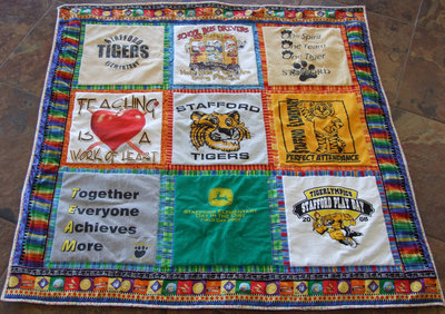 Image: Beautiful Quilt for Auction — This quilt made of Stafford T-Shirts could be yours. Come to the Chili dinner and Silent Auction.