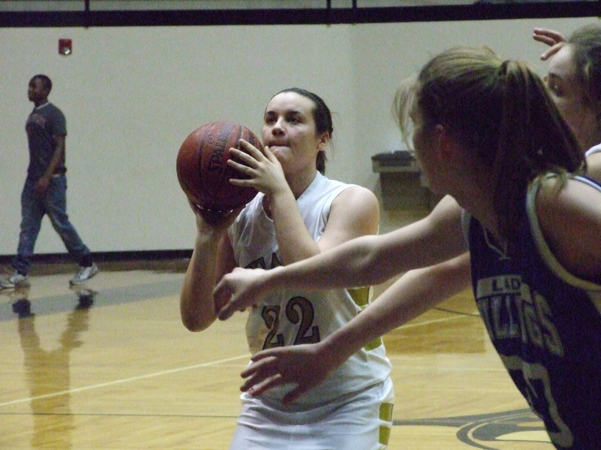 Image: Bales Being The Ball — Italy’s #22 Kaytlyn Bales tries to become one with a 28.5 lb. leather ball in an attempt to hit a free throw.