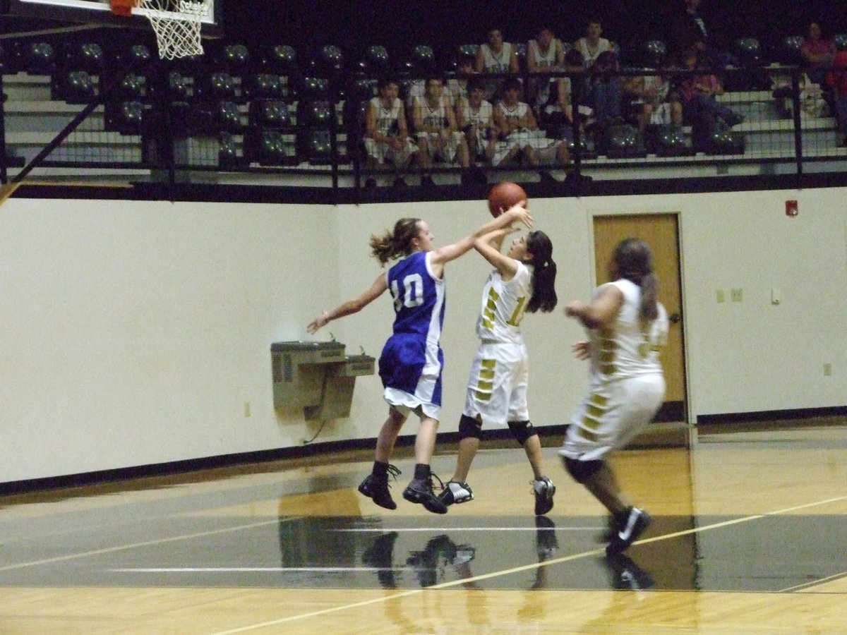 Image: Suaste Gets Fouled — Italy’s #12 Alma Suaste draws a shooting foul from a Rice defender.