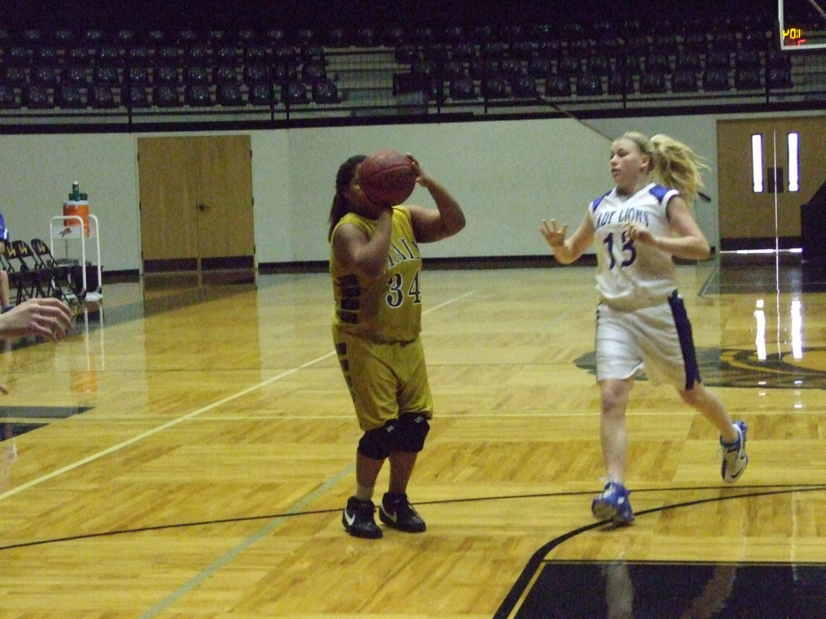 Image: Davis Drops One In — Italy’s #34 Khadijah Davis takes a jumper against Blooming grove.